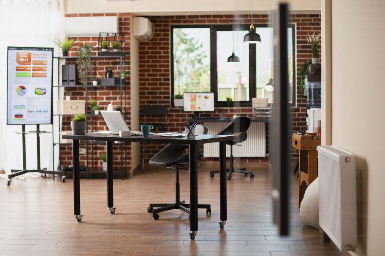 Vacant office with organized technology - Bianco Design & Build