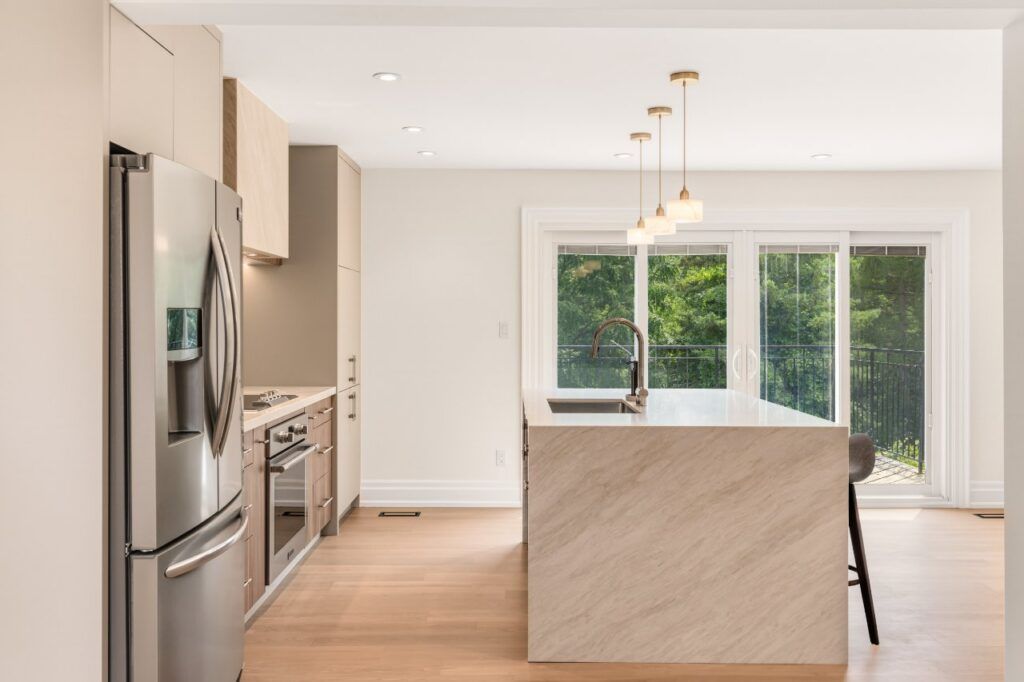 Open kitchen looking toward the walk-out patio doors